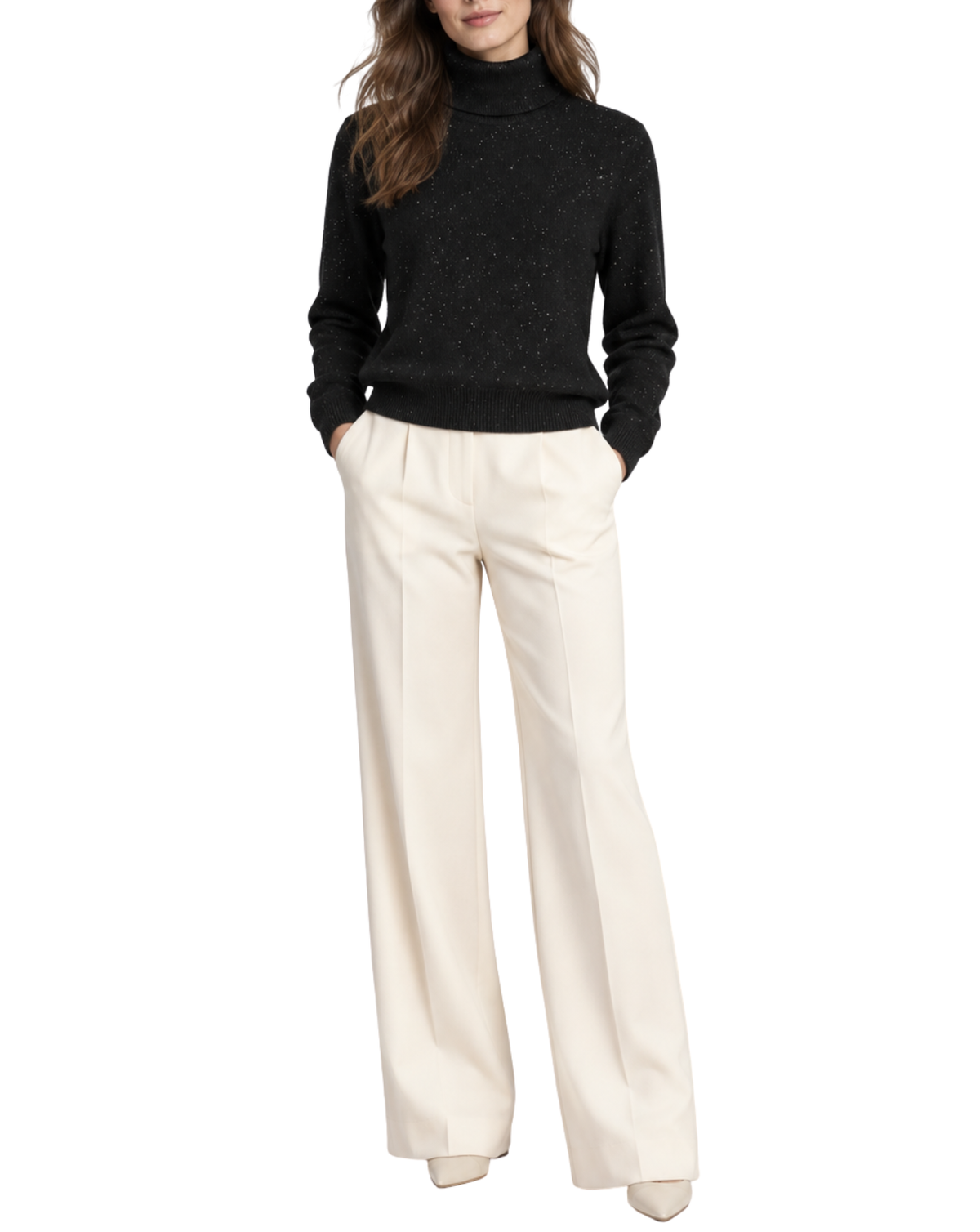 A woman wearing a black knit turtleneck sweater and off-white wide-leg trousers, standing against a plain white studio background.