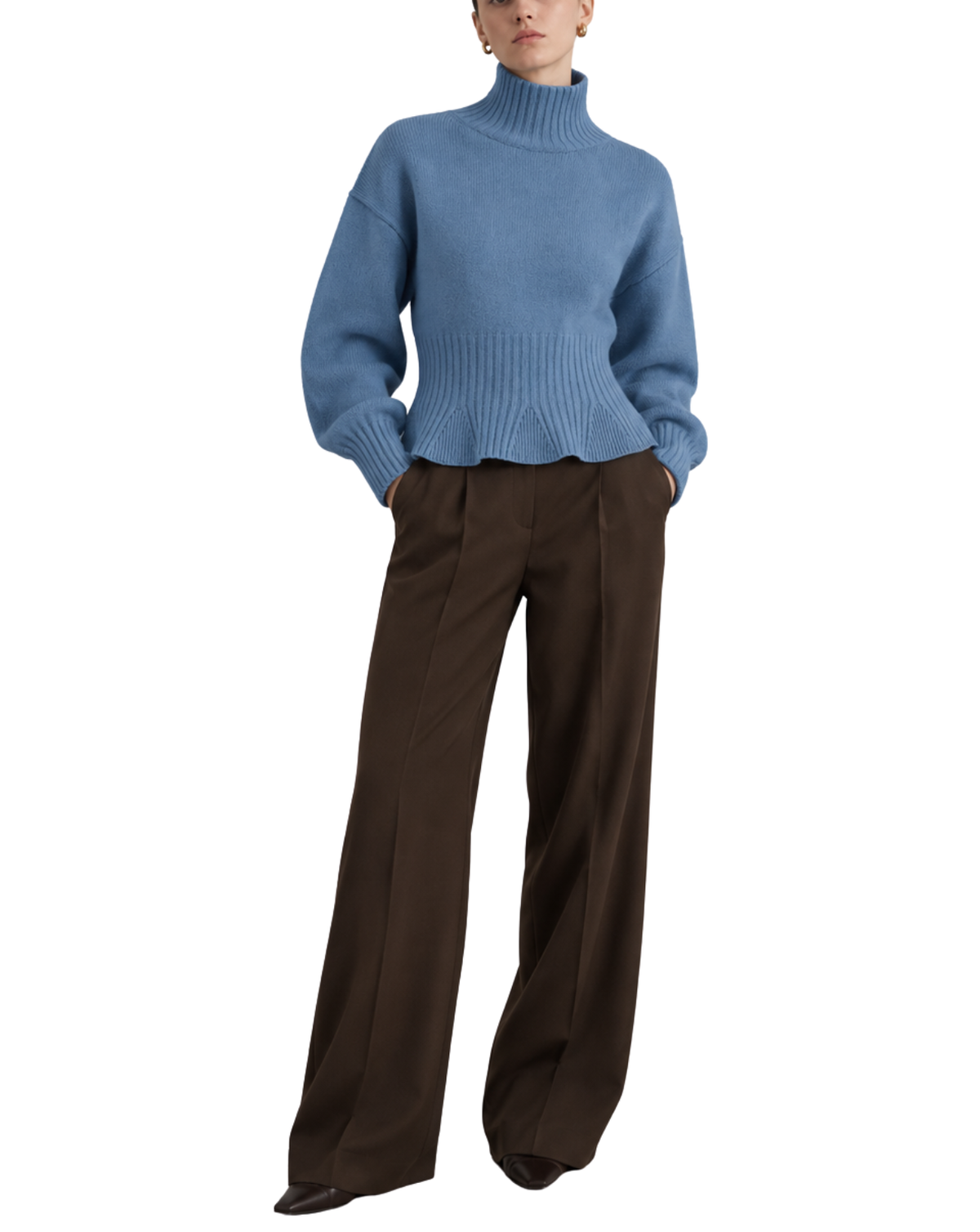 A model wearing a light blue ribbed turtleneck sweater and dark brown wide-leg trousers, shown from the neck down against a plain white background.