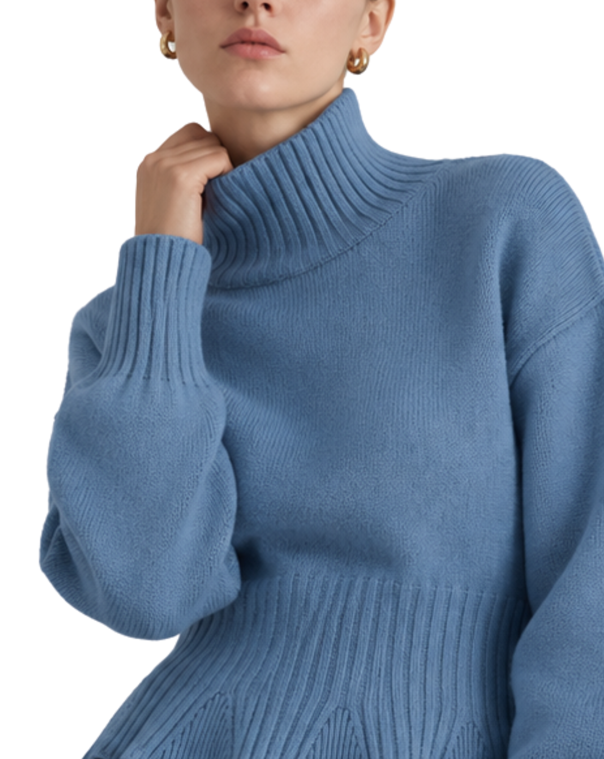 A close-up of a person wearing a dusty blue ribbed turtleneck sweater against a plain white background.