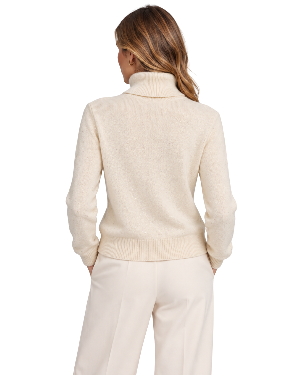 A woman shown from the back wearing a cream-colored knit turtleneck sweater and matching cream trousers against a plain white background.