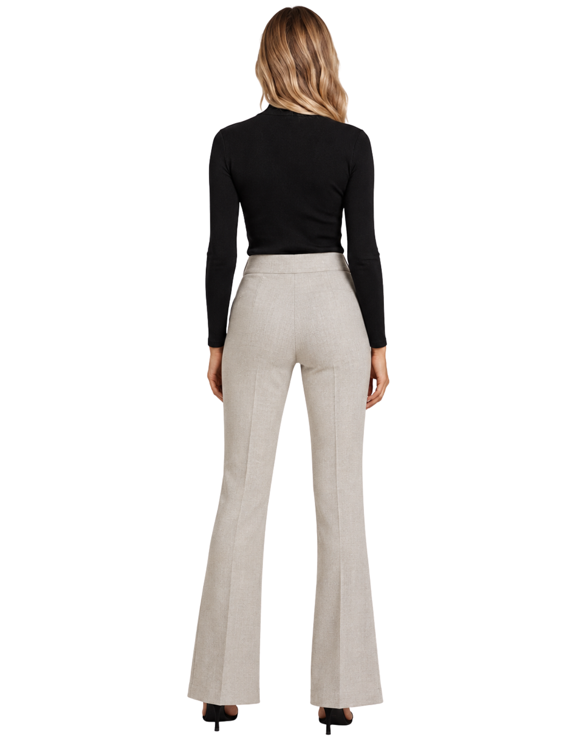 A woman shown from the back wearing a black long-sleeve mock-neck top and light beige flared trousers, photographed against a plain white studio background.