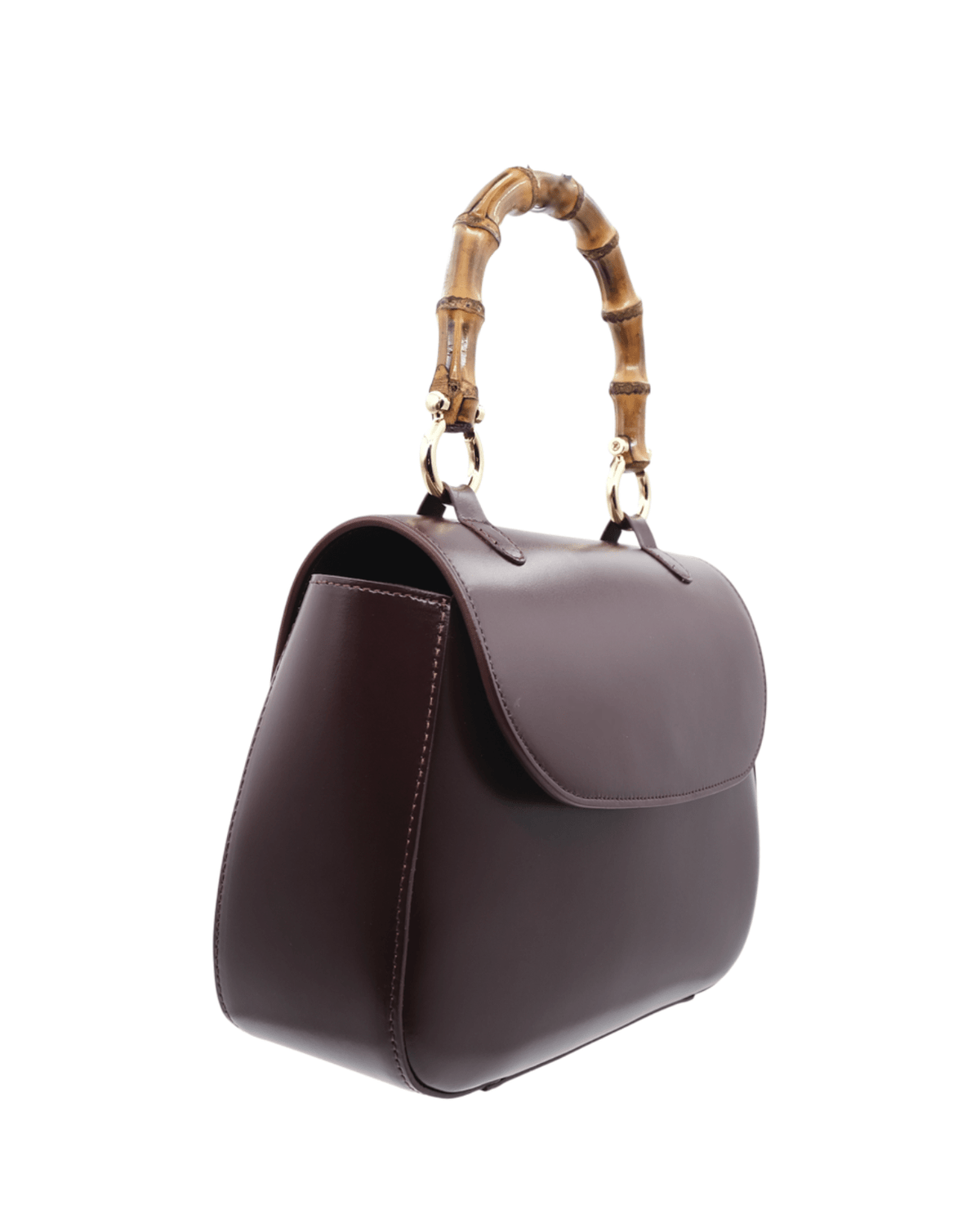 A dark brown leather handbag with a bamboo handle and gold-tone hardware, shown from a three-quarters angle on a white background.