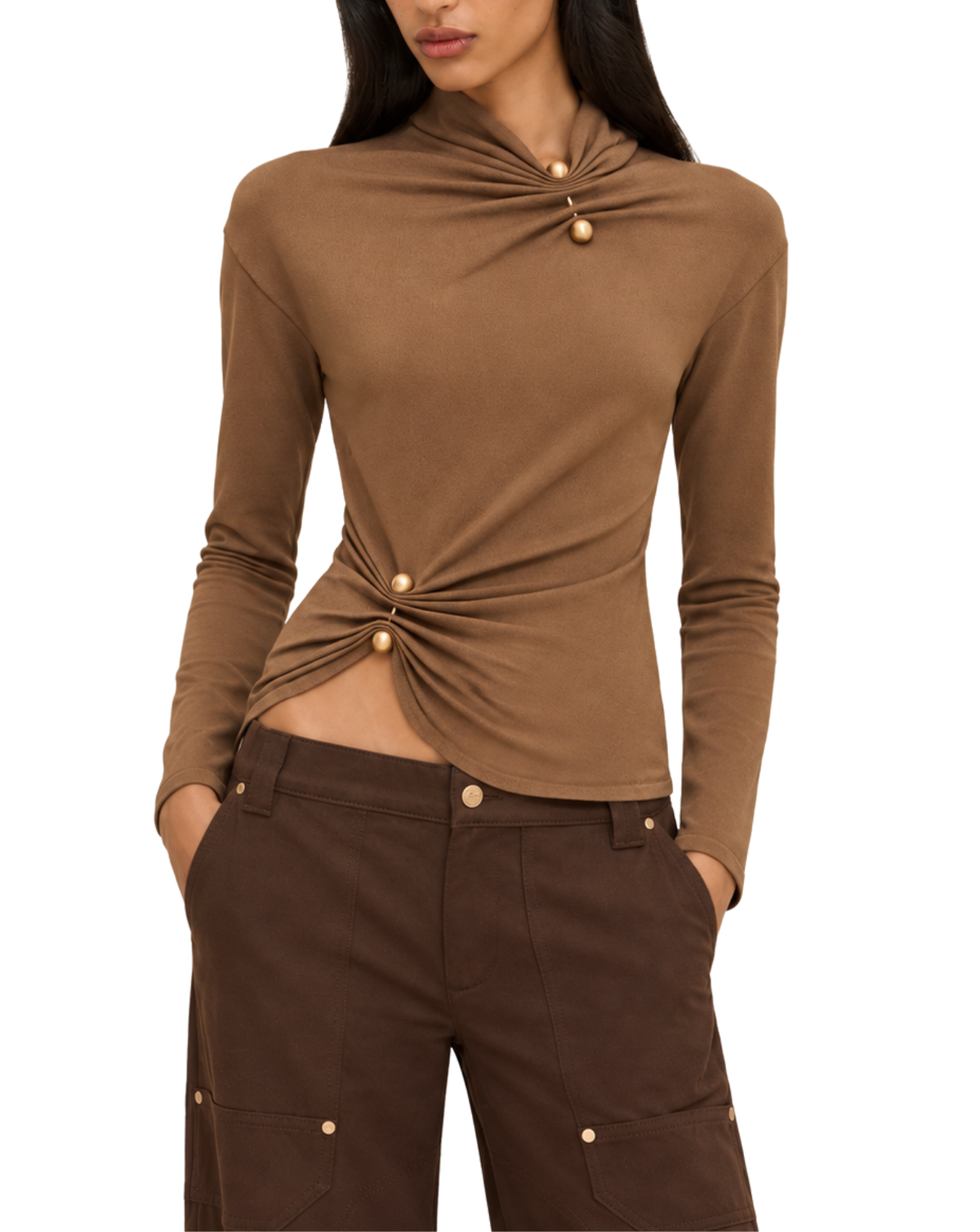 A woman wearing a fitted long-sleeve brown top with a twisted knot detail at the front and matching brown pants, photographed against a plain white background.
