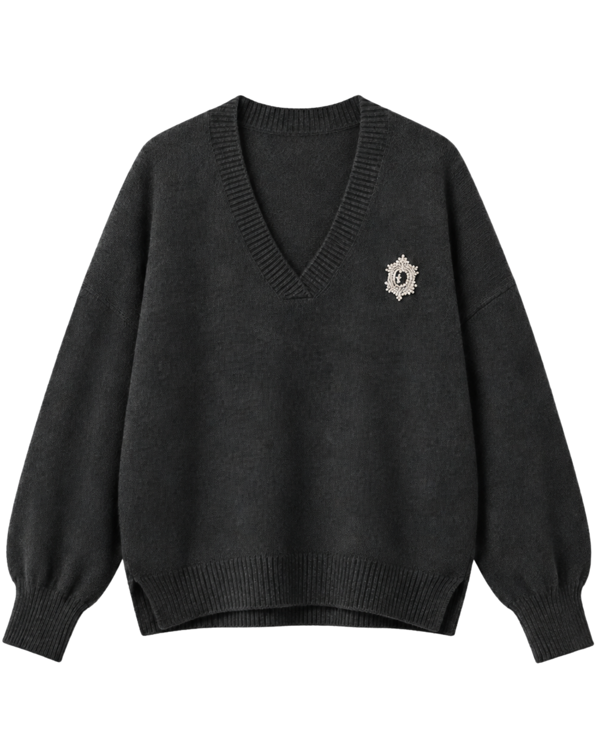 A dark charcoal gray knit sweater with a V-neckline, balloon sleeves, and a small silver-toned crest pin on the left chest, displayed against a solid white background.