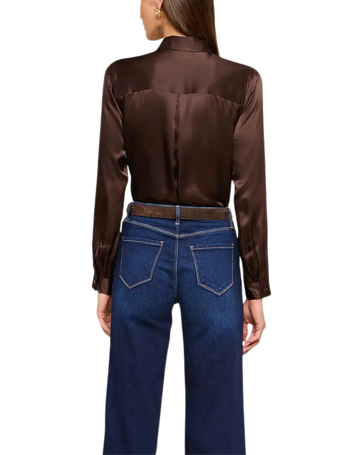 A woman shown from the back wearing a dark brown satin long-sleeve blouse tucked into dark blue jeans with a matching brown belt, against a plain white background.