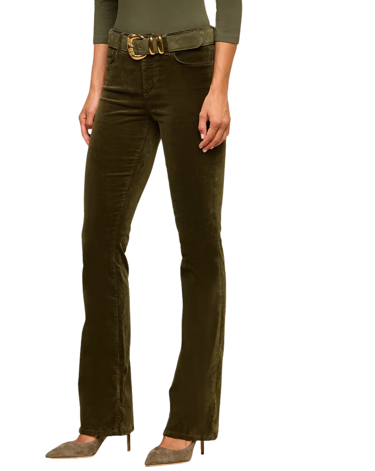 A model wearing olive green corduroy flare jeans with a matching belt and gold buckle, paired with taupe heels, shown from the waist down on a white background.