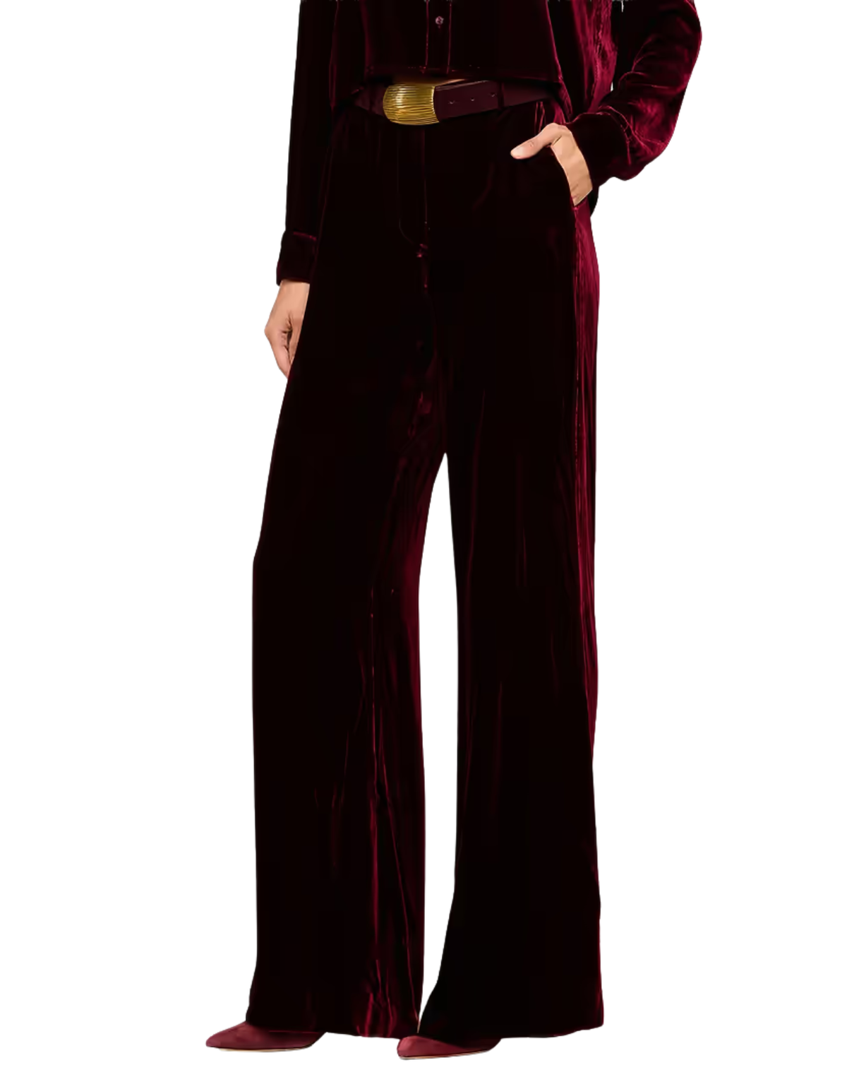 A model wearing a deep burgundy velvet wide-leg pantsuit with a matching long-sleeve top and a gold belt, shown from the waist down on a white background.