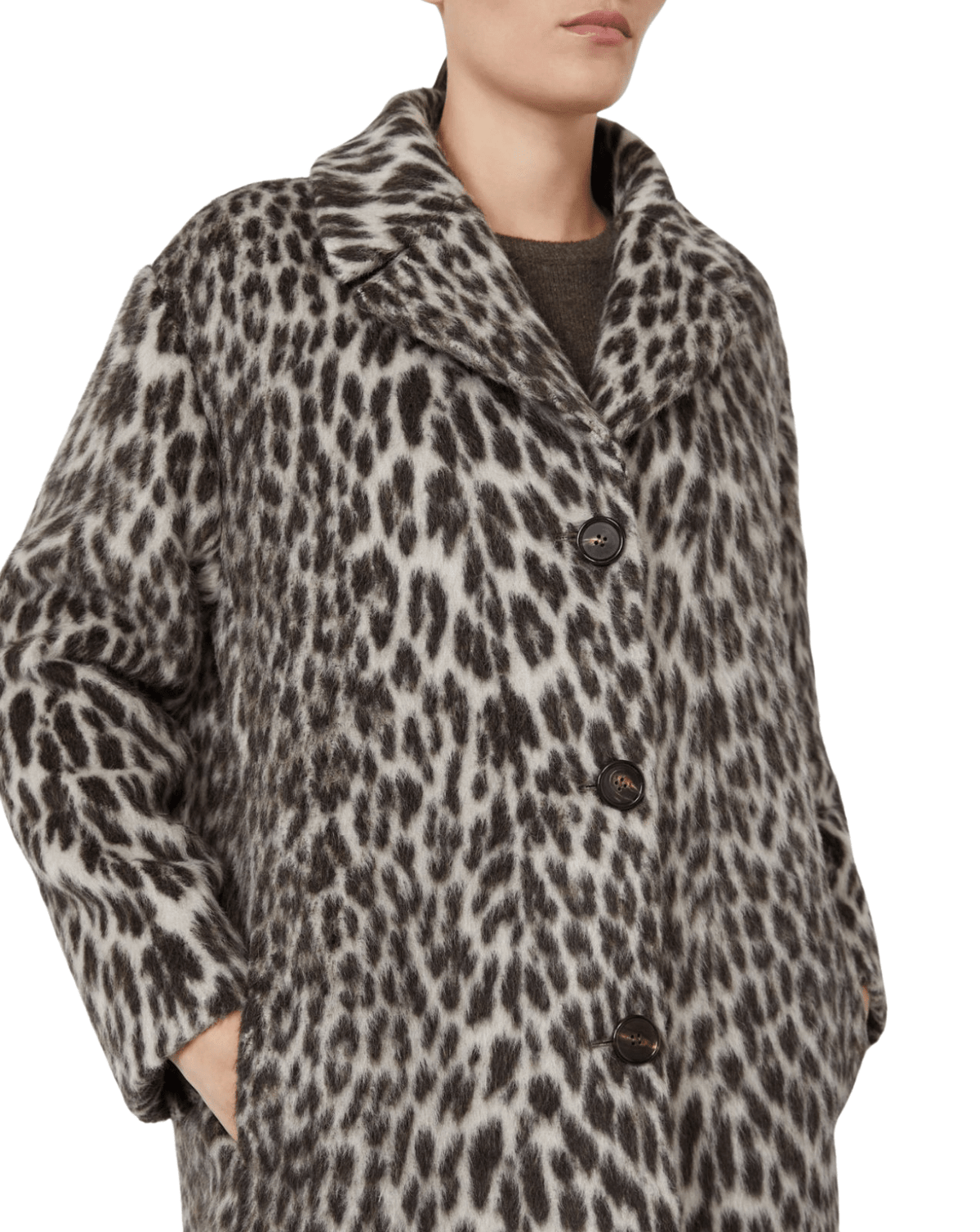 A close-up of a model wearing a leopard-print coat with a soft, plush texture, featuring a high collar and three dark buttons, set against a plain white background.