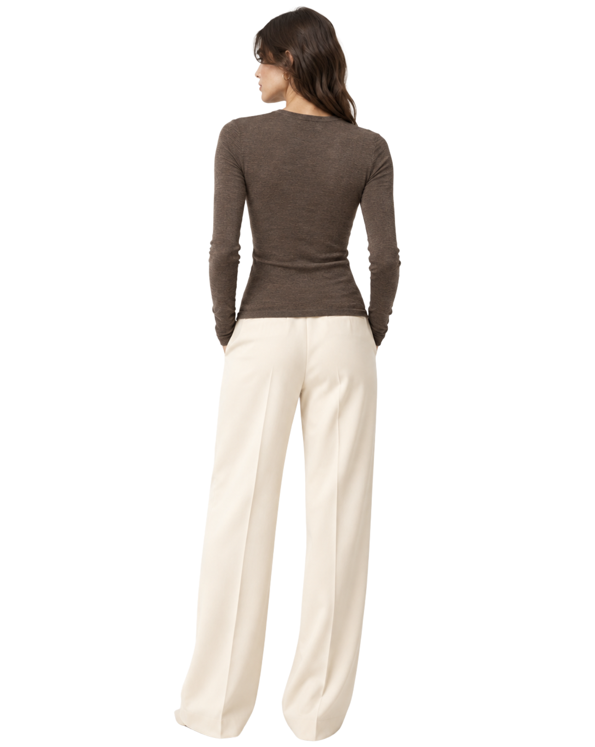 A woman shown from the back wearing a fitted brown long-sleeve top and off-white wide-leg trousers against a plain white studio background.