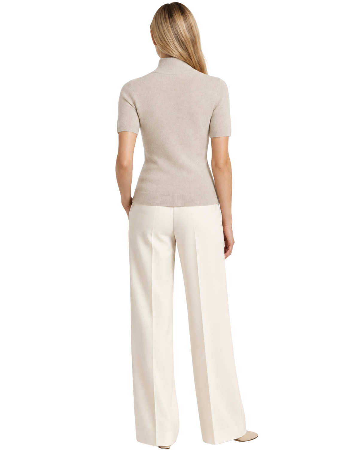 A woman shown from the back wearing a light beige short-sleeve mock-neck knit top and off-white wide-leg trousers, photographed against a solid white background.