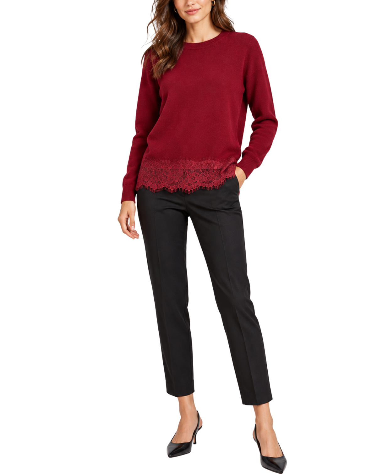A woman modeling a long-sleeve crewneck sweater in deep burgundy with a scalloped lace hem, paired with black cropped pants and black heels, against a plain white background.