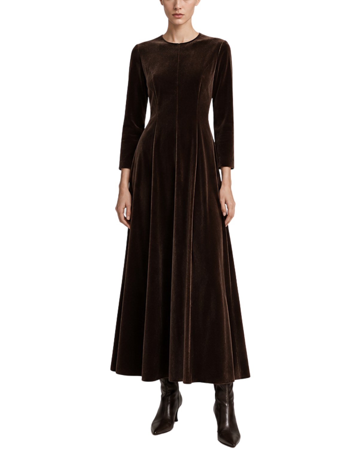 A model wearing a long-sleeved, dark brown velvet maxi dress with a structured bodice and flared skirt, paired with dark brown ankle boots, set against a plain white background.