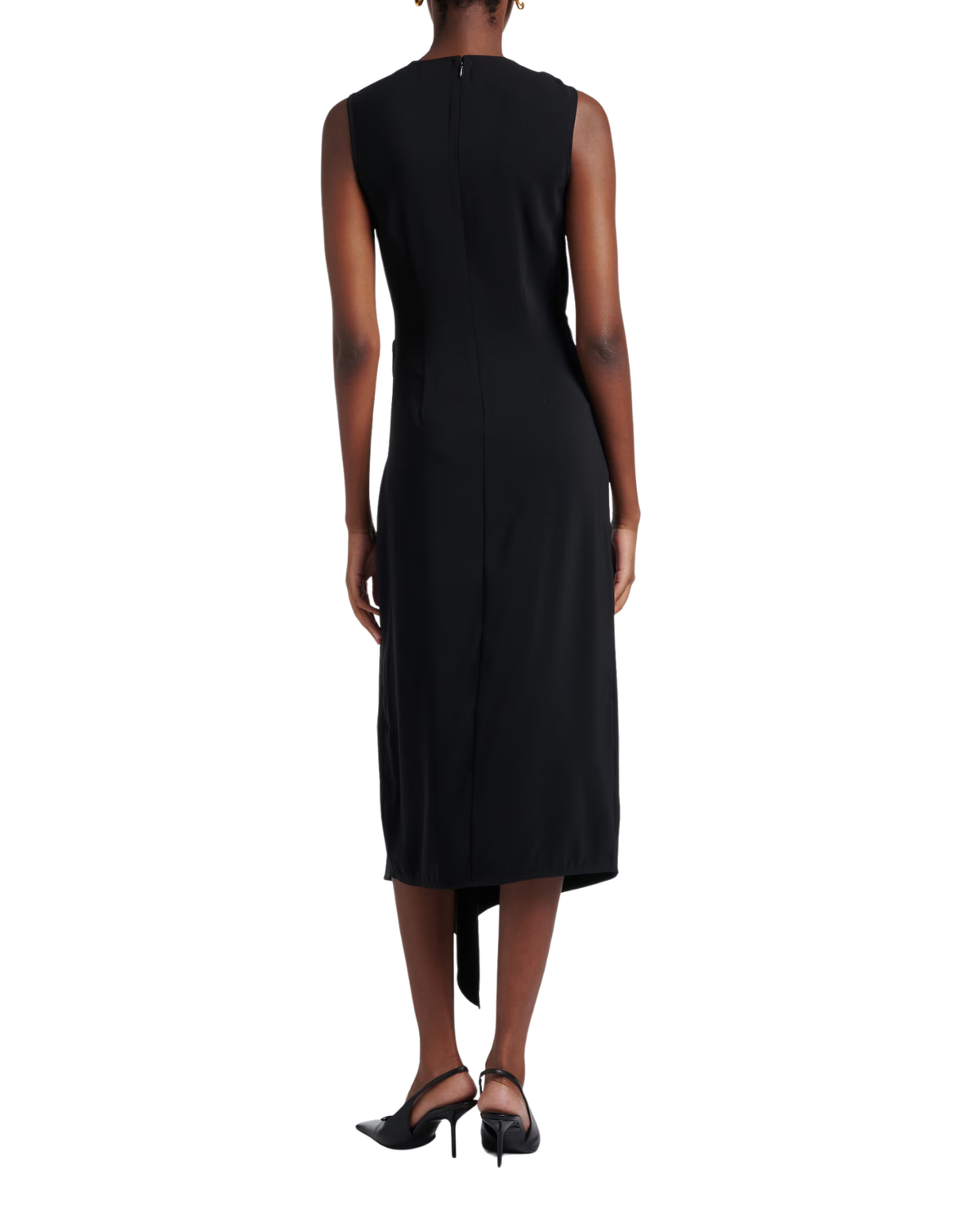 A woman shown from the back wearing a sleeveless black midi dress with a tie detail at the hem, paired with black high heels, against a plain white background.