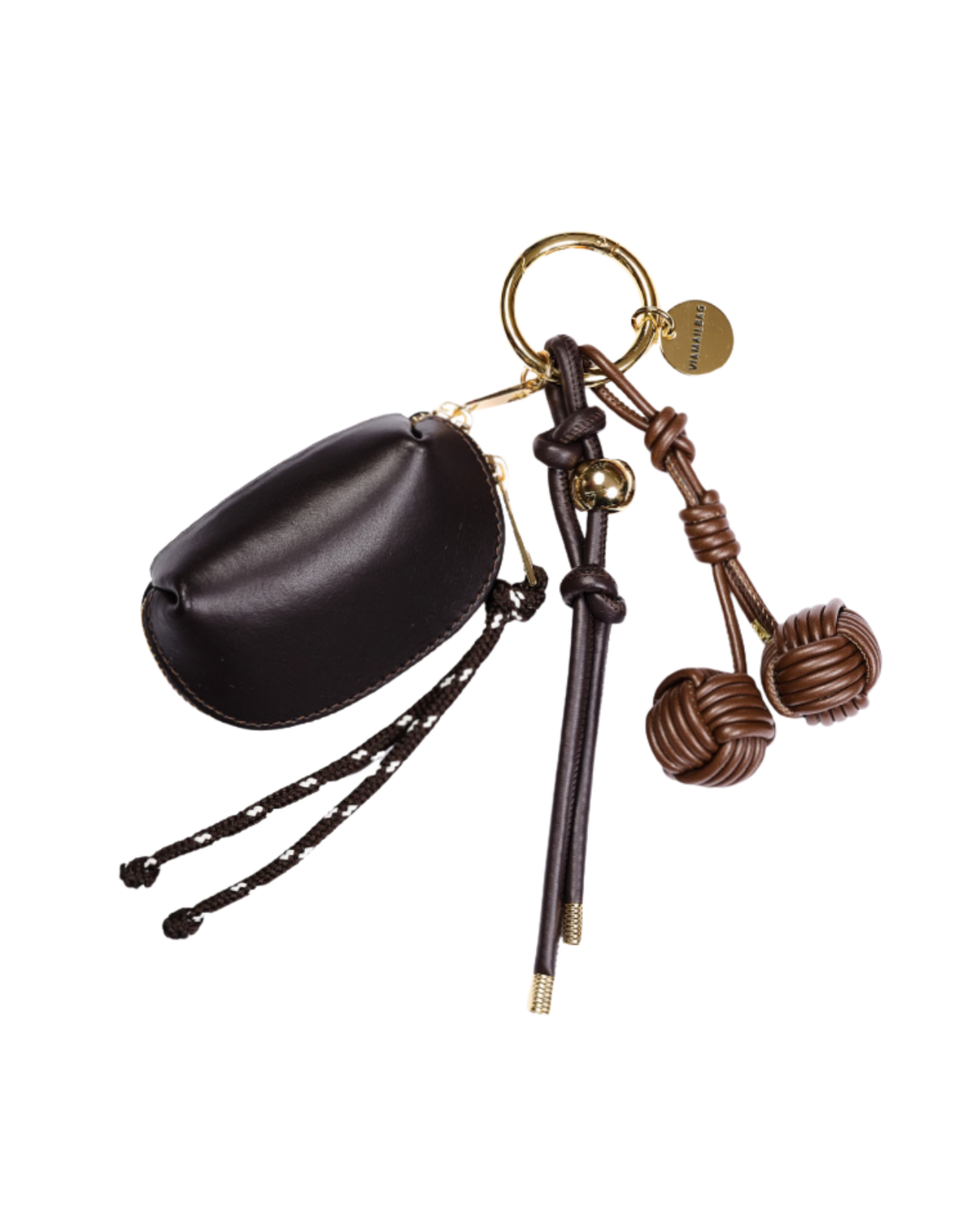 A luxury leather keychain set featuring a black leather pouch, a black leather key fob with braided strap, and brown leather keychains with knotted details and gold-tone hardware, displayed on a clean white background.